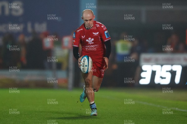 160224 - Scarlets v Munster - United Rugby Championship - Ioan Nicholas of Scarlets chips the ball