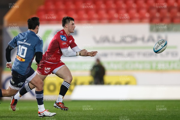 160224 - Scarlets v Munster - United Rugby Championship - Joe Roberts of Scarlets passes the ball