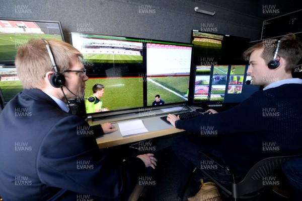 210215 - Scarlets v Munster - Guinness PRO12 -Television match official Simon McDowell (left) looks on during a trial of a hawk eye system during the Guinness PRO12 game between Scarlets and Munster