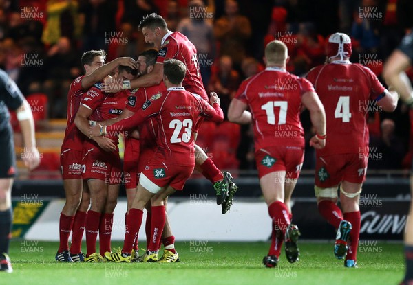 231015 - Scarlets v Munster - Guinness PRO12 - Steven Shingler of Scarlets celebrates with team mates after kicking a penalty to win the game