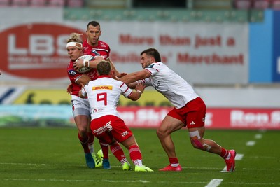 270925 - Scarlets v Munster - United Rugby Championship - Blair Murray of Scarlets is tackled by Craig Casey of Munster