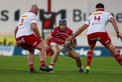 270925 - Scarlets v Munster - United Rugby Championship - Tom Rogers of Scarlets looks for a gap