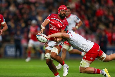 270925 - Scarlets v Munster - United Rugby Championship - Josh Macleod of Scarlets loses the ball in a tackle close to the try line