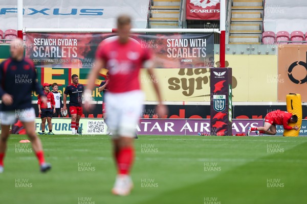 270925 - Scarlets v Munster - United Rugby Championship - Stand with Scarlets banner on the posts before the match