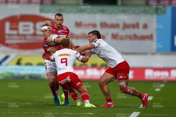 270925 - Scarlets v Munster - United Rugby Championship - Blair Murray of Scarlets is tackled by Craig Casey of Munster
