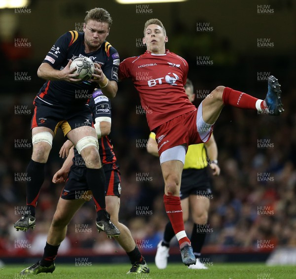 150417 - Newport Gwent Dragons v Scarlets - Guinness PRO12 - Lewis Evans of Newport Gwent Dragons wins the high ball from Liam Williams of Scarlets