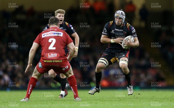 150417 - Newport Gwent Dragons v Scarlets - Guinness PRO12 - Ollie Griffiths of Newport Gwent Dragons is challenged by Ken Owens of Scarlets