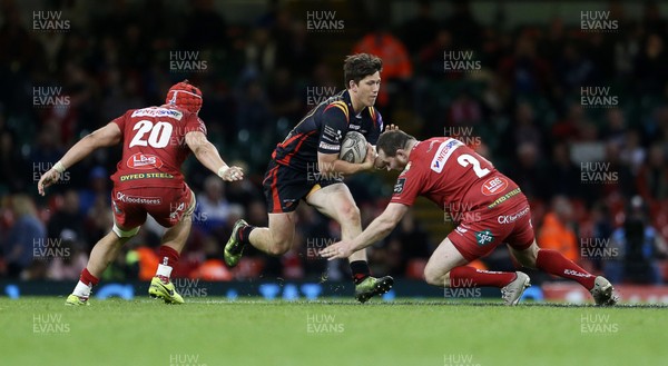 150417 - Newport Gwent Dragons v Scarlets - Guinness PRO12 - Sam Beard of Newport Gwent Dragons is tackled by Ken Owens of Scarlets