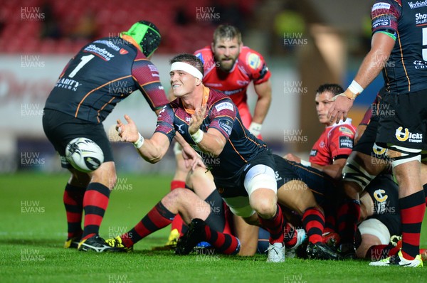 301015 - Scarlets v Newport Gwent Dragons - Guinness PRO12 -Ed Jackson of Newport Gwent Dragons gets the ball away