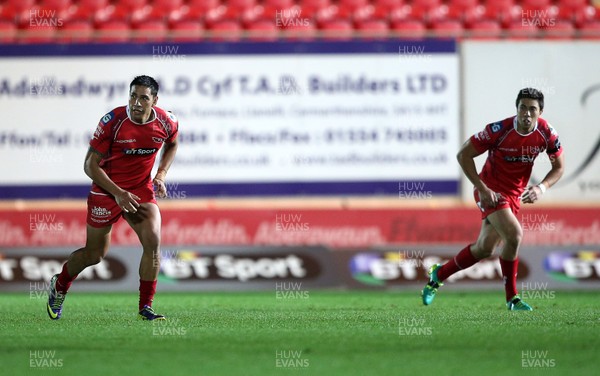 301015 - Scarlets v Newport Gwent Dragons - Guinness PRO12 - Regan King and his son Jacob Cowley of Scarlets