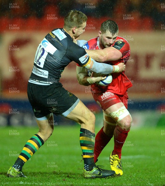 230116 - Scarlets v Northampton - European Rugby Champions Cup -Morgan Allen of Scarlets is tackled by Harry Mallinder of Northampton