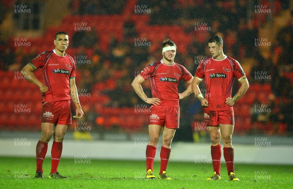 230116 - Scarlets v Northampton - European Rugby Champions Cup -Regan King, Steff Hughes and Steven Shingler of Scarlets look dejected