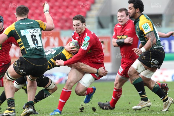 14.01.12 Scarlets v Northampton... Scarlets George North is tackled by Phil Dowson.  