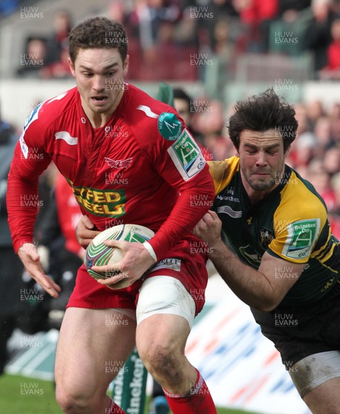 14.01.12 Scarlets v Northampton... Scarlets George North is tackled by Ben Foden.  