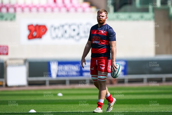 040921 - Scarlets v Nottingham - Preseason Friendly - Tom Phillips of Scarlets warms up ahead of the match