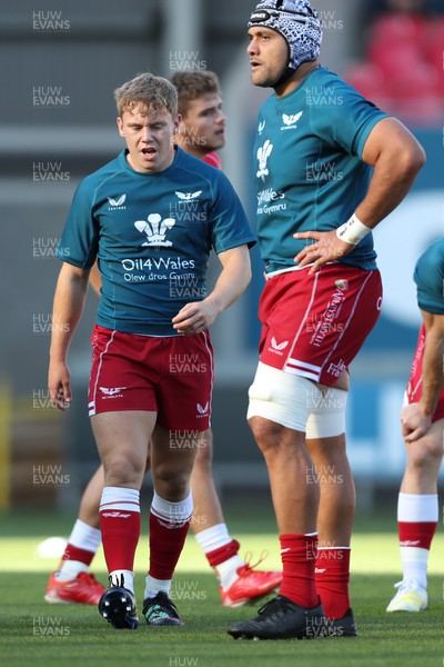 170922 - Scarlets v Ospreys - United Rugby Championship - Sam Costelow and Sione Kalamafoni of Scarlets of Scarlets in the warm up 