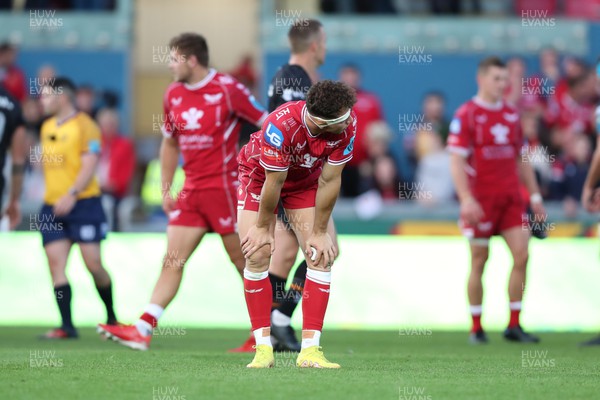 170922 - Scarlets v Ospreys - United Rugby Championship - Tom Rogers of Scarlets dejected at the final whistle