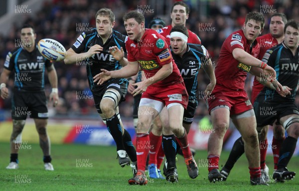 26.12.11 - Scarlets v Ospreys - RaboDirect PRO12 - Rhys Priestland of Scarlets gets the ball away. 