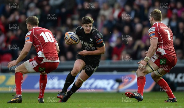 261213 - Scarlets v Ospreys - RaboDirect PRO12 -Sam Lewis of Ospreys takes on John Barclay of Scarlets