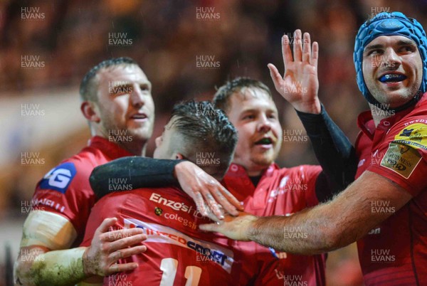 261217 - Scarlets v Ospreys - Guinness PRO14 - Steff Evans of the Scarlets celebrates his try with team mates