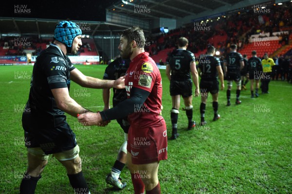 261217 - Scarlets v Ospreys - Guinness PRO14 - Justin Tipuric of Ospreys and Leigh Halfpenny of Scarlets at the end of the game