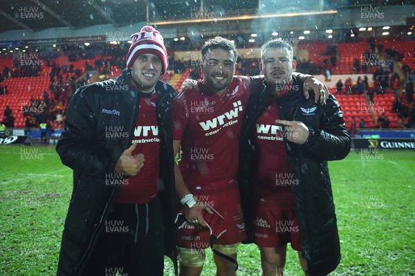261217 - Scarlets v Ospreys - Guinness PRO14 - Dan Jones, Josh Macleod and Rob Evans of Scarlets at the end of the game