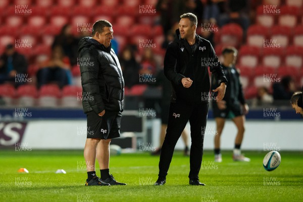 261223 - Scarlets v Ospreys - United Rugby Championship - Ospreys head coach Toby Booth with coach Mark Jones before the match