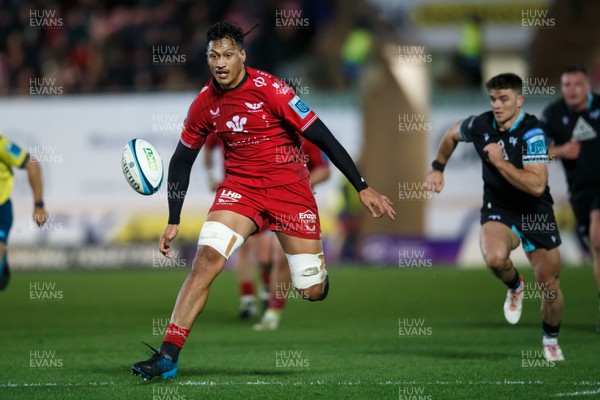261223 - Scarlets v Ospreys - United Rugby Championship - Sam Lousi of Scarlets chases after the ball