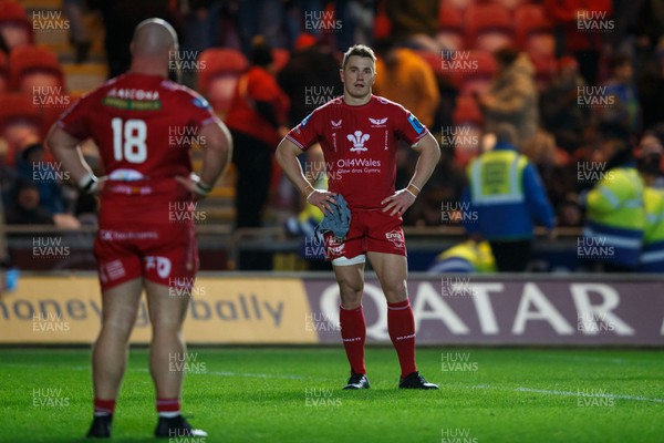 261223 - Scarlets v Ospreys - United Rugby Championship - Joe Jones and Jonathan Davies of Scarlets look despondent at the end of the match