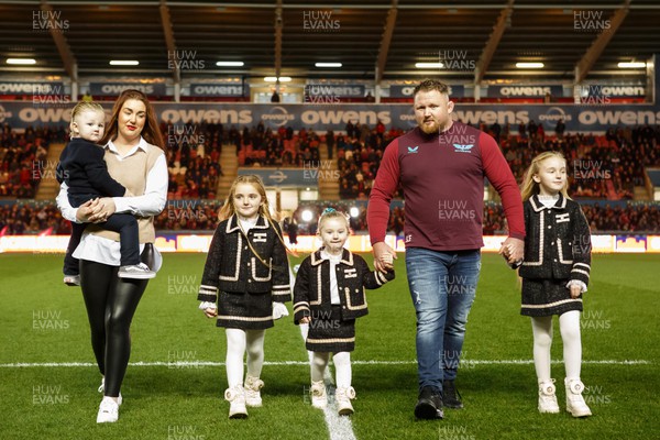 261223 - Scarlets v Ospreys - United Rugby Championship - Former Scarlets prop Samson Lee takes his family onto the pitch before the match on the occasion of his retirement from playing rugby