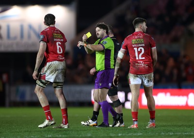 261225 - Scarlets v Ospreys - United Rugby Championship - Max Douglas of Scarlets is given a yellow card by Referee Ben Whitehouse 