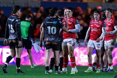 261225 - Scarlets v Ospreys - United Rugby Championship - Dan Edwards of Ospreys and Joe Hawkins of Scarlets at the end of the match