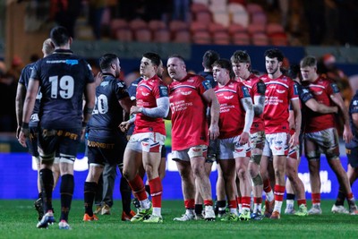 261225 - Scarlets v Ospreys - United Rugby Championship - Teams shake hands at the end of the match