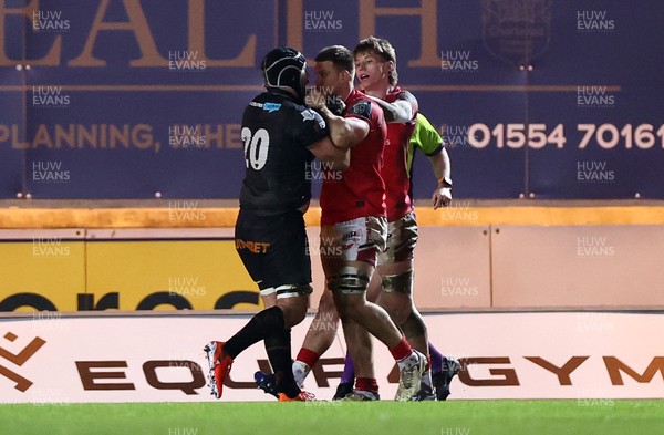 261225 - Scarlets v Ospreys - United Rugby Championship - Morgan Morris of Ospreys and Jarrod Taylor of Scarlets lock horns
