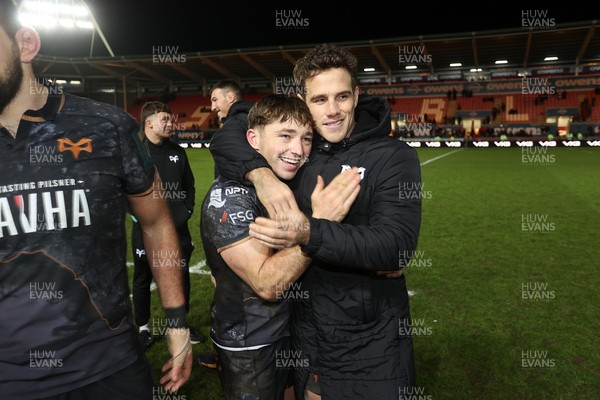 261225 - Scarlets v Ospreys - United Rugby Championship - Dan Edwards and Kieran Hardy of Ospreys at full time