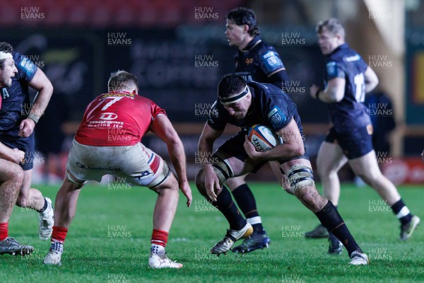 261225 - Scarlets v Ospreys - United Rugby Championship - Ryan Smith of Ospreys takes on Taine Plumtree of Scarlets