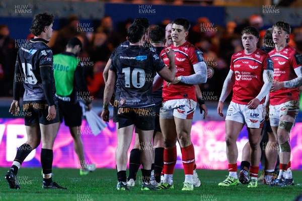 261225 - Scarlets v Ospreys - United Rugby Championship - Dan Edwards of Ospreys and Joe Hawkins of Scarlets at the end of the match