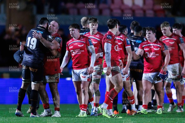 261225 - Scarlets v Ospreys - United Rugby Championship - Teams shake hands at the end of the match
