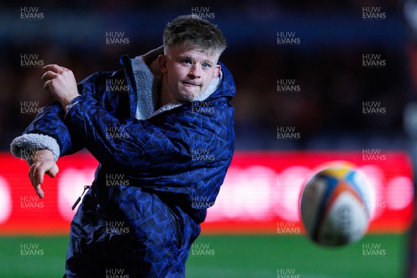 261225 - Scarlets v Ospreys - United Rugby Championship - Archie Hughes of Scarlets warms up during the match