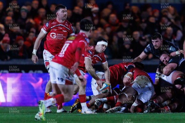 261225 - Scarlets v Ospreys - United Rugby Championship - Gareth Davies of Scarlets passes the ball