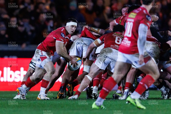 261225 - Scarlets v Ospreys - United Rugby Championship - Gareth Davies of Scarlets passes the ball
