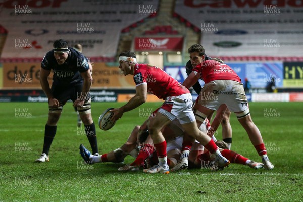 261225 - Scarlets v Ospreys - United Rugby Championship - Gareth Davies of Scarlets passes the ball close to his try line