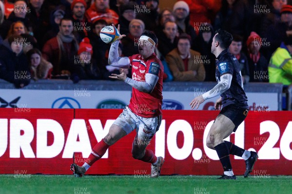 261225 - Scarlets v Ospreys - United Rugby Championship - Tom Rogers of Scarlets gathers the ball