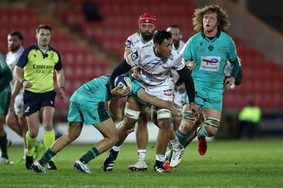 100126 - Scarlets v Section Paloise - Investec Champions Cup - Sam Lousi of Scarlets is tackled by Quentin Valentino of Pau 