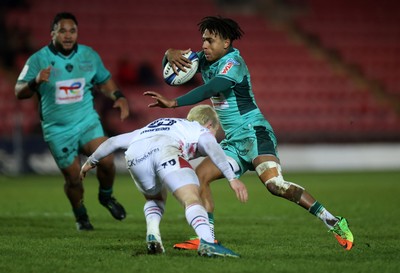 100126 - Scarlets v Section Paloise - Investec Champions Cup - Theo Attissogbe of Pau is tackled by Blair Murray of Scarlets 