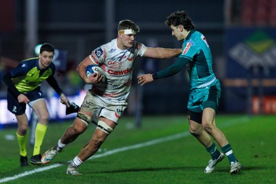 100126 - Scarlets v Section Paloise - Investec Champions Cup - Taine Plumtree of Scarlets hands off Gregoire Arfeuil of Pau