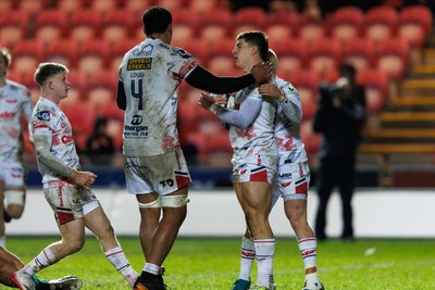 100126 - Scarlets v Section Paloise - Investec Champions Cup - Joe Hawkins of Scarlets celebrates with Sam Lousi of Scarlets after scoring a try