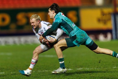 100126 - Scarlets v Section Paloise - Investec Champions Cup - Blair Murray of Scarlets is tackled by Gregoire Arfeuil of Pau