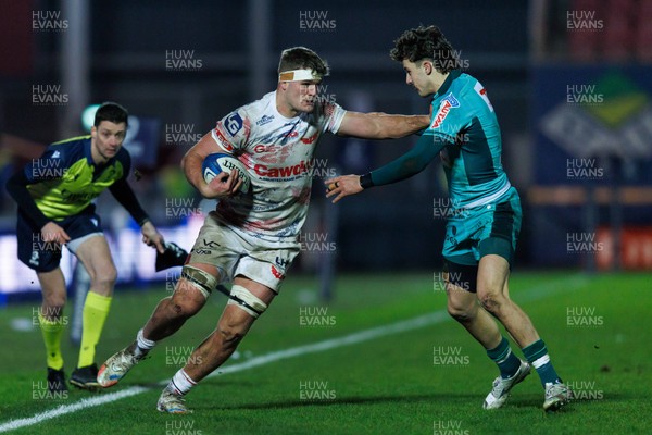 100126 - Scarlets v Section Paloise - Investec Champions Cup - Taine Plumtree of Scarlets hands off Gregoire Arfeuil of Pau