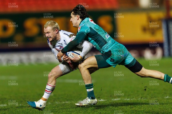 100126 - Scarlets v Section Paloise - Investec Champions Cup - Blair Murray of Scarlets is tackled by Gregoire Arfeuil of Pau